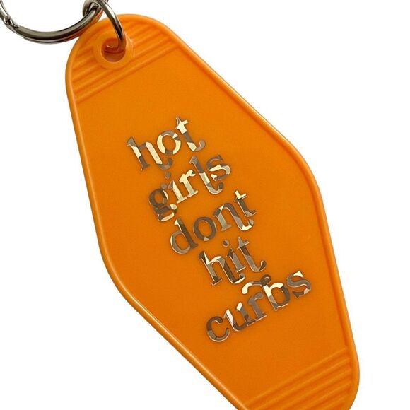 Orange Motel Room Keychain Holographic print says “hot girls don’t hit curbs” - Picture 5 of 7